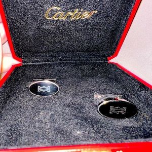 Selling brand new never worn Cartier sterling silver black enamel cufflinks.